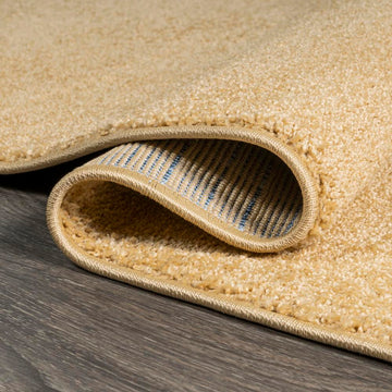 Haze Solid Low-pile Area Rug Mustard